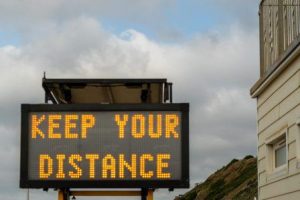 traffic sign saying Keep Your Distance, ego, stay away